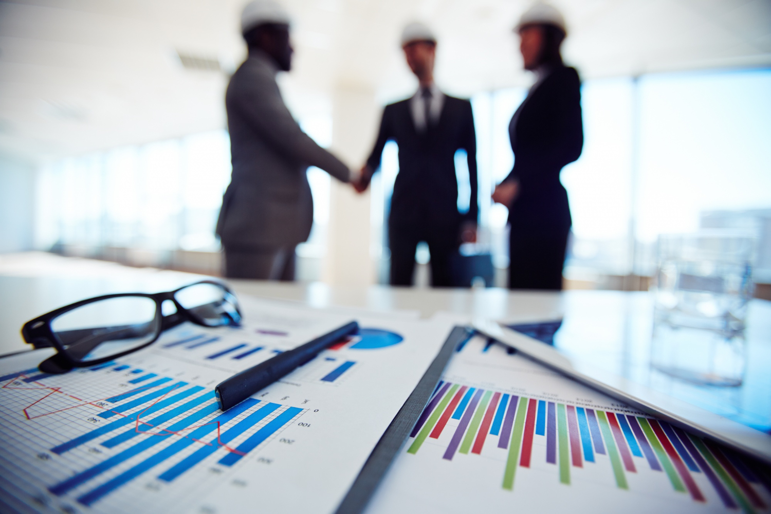 Charts and documents arranged for governance and assurance review.